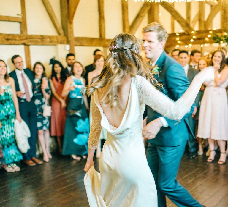 First Dance | Bride in Fred & Ginger Bridal Design Gown | Groom in Navy Mullen & Mullen Suit | Pastel Spring Wedding at Loseley Park Barn | Sarah-Jane Ethan Photography | Captured Media Weddings Film