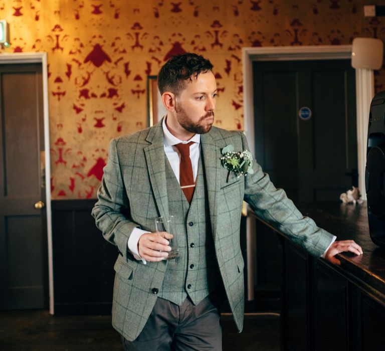 Groom in Check Moss Bros Suit | Stylish Bride in Saldana Vintage Bridal Separates & Greenery Flower Crown | Intimate Pub Wedding at The Bell in Ticehurst | Dale Weeks Photography