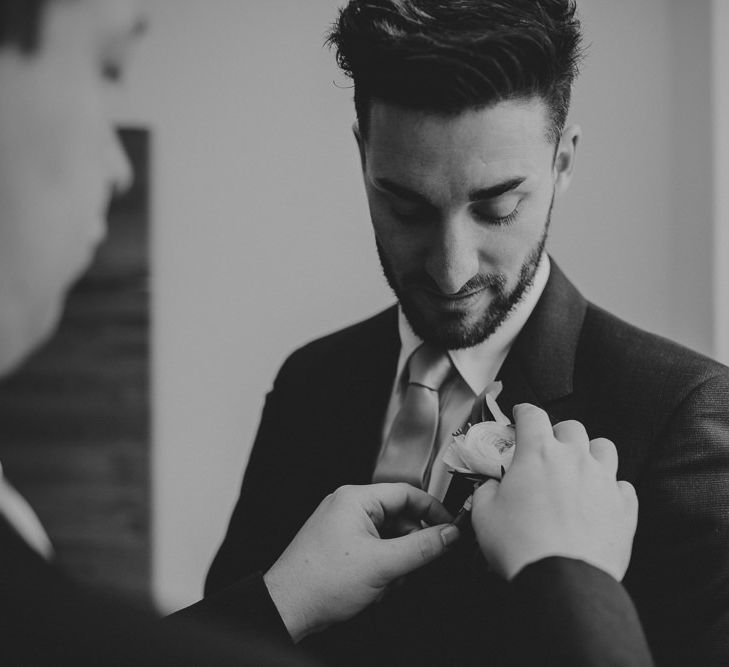 Groom Getting Ready For Winter Wedding