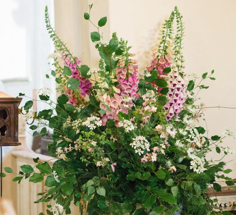 Church Floral Arrangement | Bride in Ingrida Bridal Gown | Beautiful Classic Wedding at Cornwell Manor | Lucy Davenport Photography