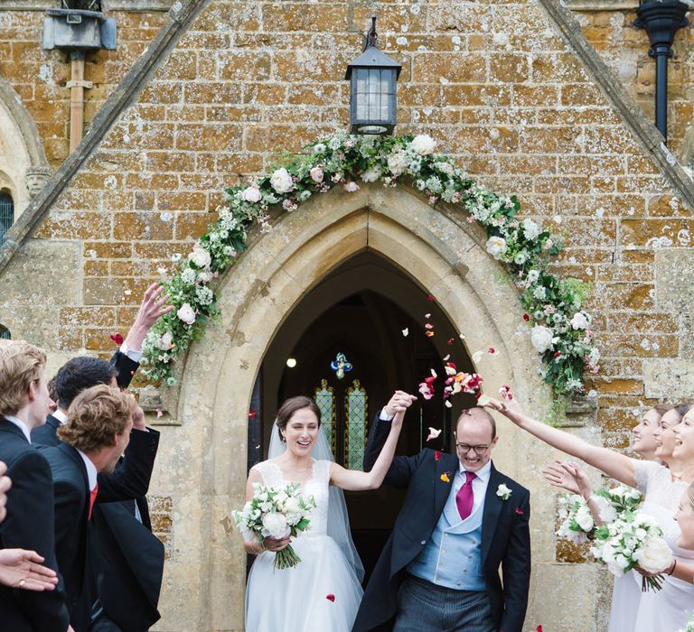 Confetti Exit | Bride in Ingrida Bridal Gown | Groom in Tails | Beautiful Classic Wedding at Cornwell Manor | Lucy Davenport Photography