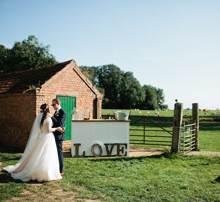 Bride in Naomi Neoh Gown | Groom in Hackett Suit | Natalie Hewitt Planned Wedding at Normanton Church & Kingsthorpe Lodge Barn | Jeni Smith Photography | Blue Ridge Wedding Videography