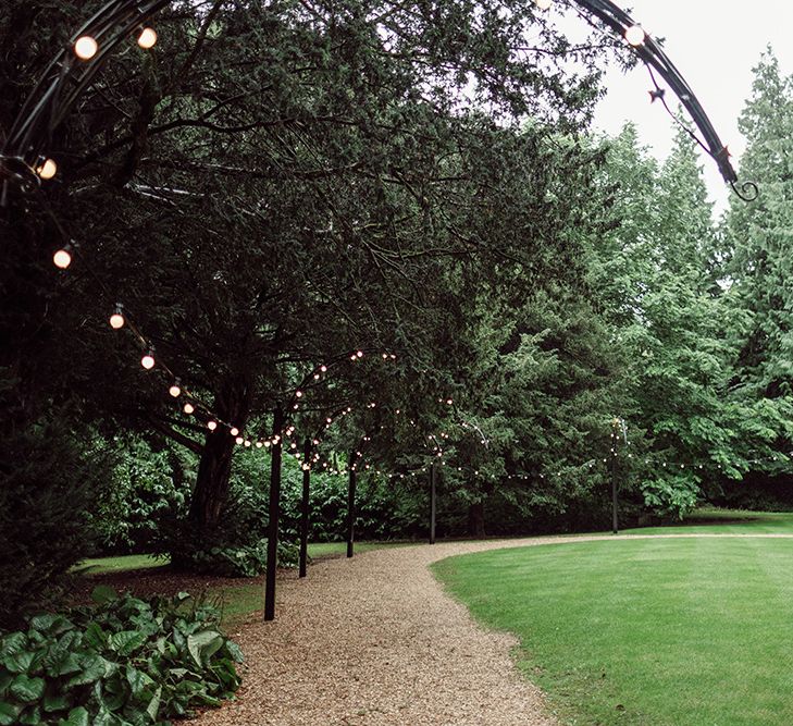 Pronovias Bride With Relaxed Up Do For A Navy & Gold Themed Wedding At Larmer Tree Gardens With Images From Jason Mark Harris