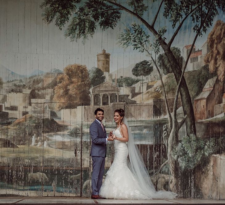 Pronovias Bride With Relaxed Up Do For A Navy & Gold Themed Wedding At Larmer Tree Gardens With Images From Jason Mark Harris