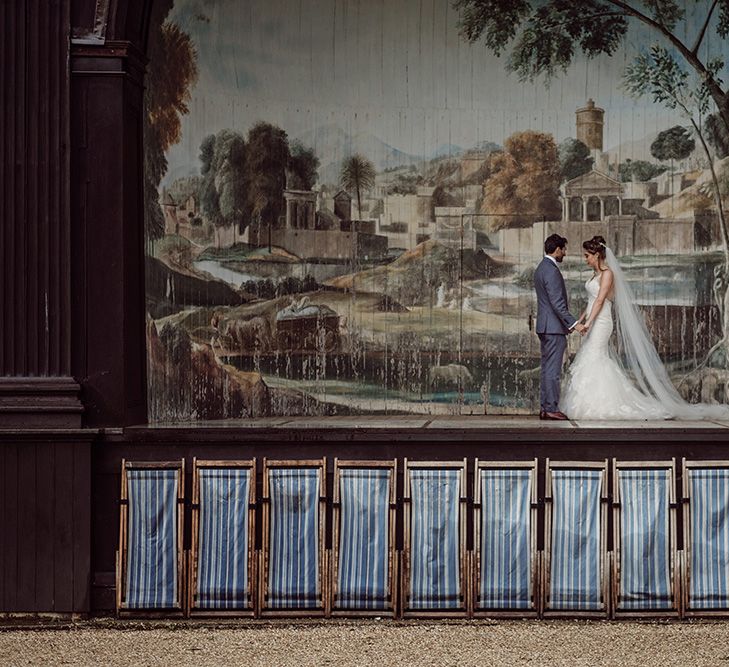 Pronovias Bride With Relaxed Up Do For A Navy & Gold Themed Wedding At Larmer Tree Gardens With Images From Jason Mark Harris