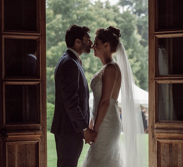 Pronovias Bride With Relaxed Up Do For A Navy & Gold Themed Wedding At Larmer Tree Gardens With Images From Jason Mark Harris