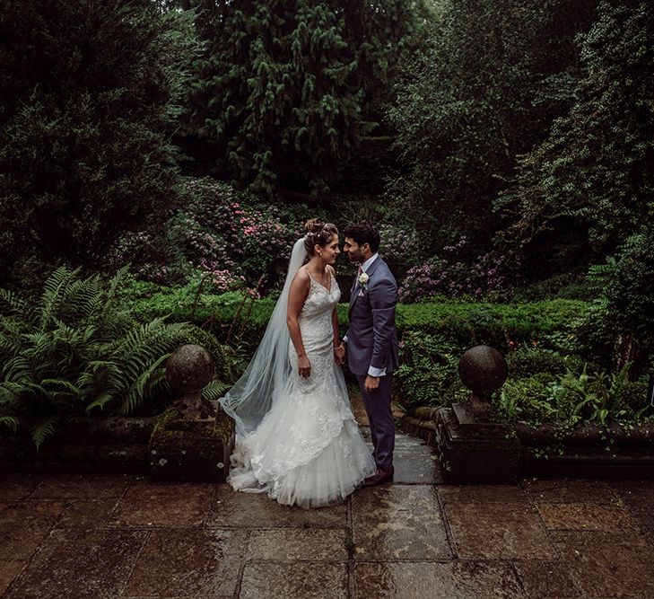 Pronovias Bride With Relaxed Up Do For A Navy & Gold Themed Wedding At Larmer Tree Gardens With Images From Jason Mark Harris