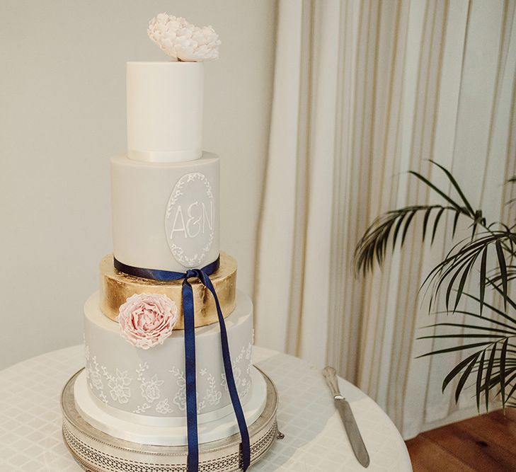 Pronovias Bride With Relaxed Up Do For A Navy & Gold Themed Wedding At Larmer Tree Gardens With Images From Jason Mark Harris