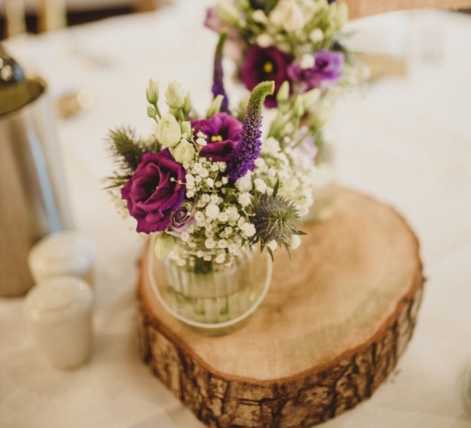 Rustic Wood Slice with Flower Stems in Jars | Intimate Anglers Rest Pub Wedding Reception | Antonija Nekic Photography