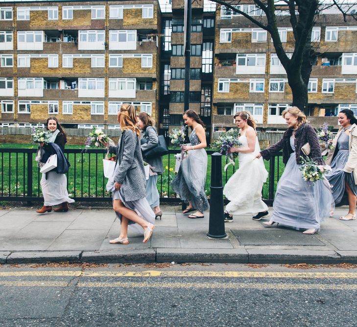 Bride & Bridesmaids Walking To Wedding Ceremony