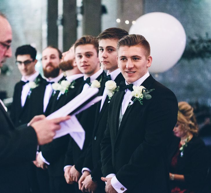 Groom & Groomsmen In Moss Bros