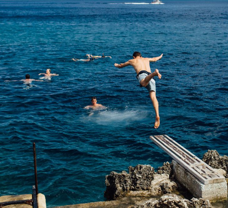 Swimming in the Sea | Bride & Groom | Outdoor Greek Destination Wedding at The Peligoni Club | Lucy Turnbull Photography