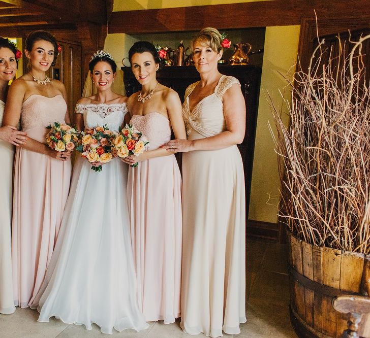 Bride in Suzanne Neville Heather Wedding Dress | Bridesmaids in Nude & Blush Mori Lee Gowns | Coral & Green Wedding at The Italian Villa in Poole, Dorset with Japanese Gardens | Peppermint Love Photography | Wedding Memories Film