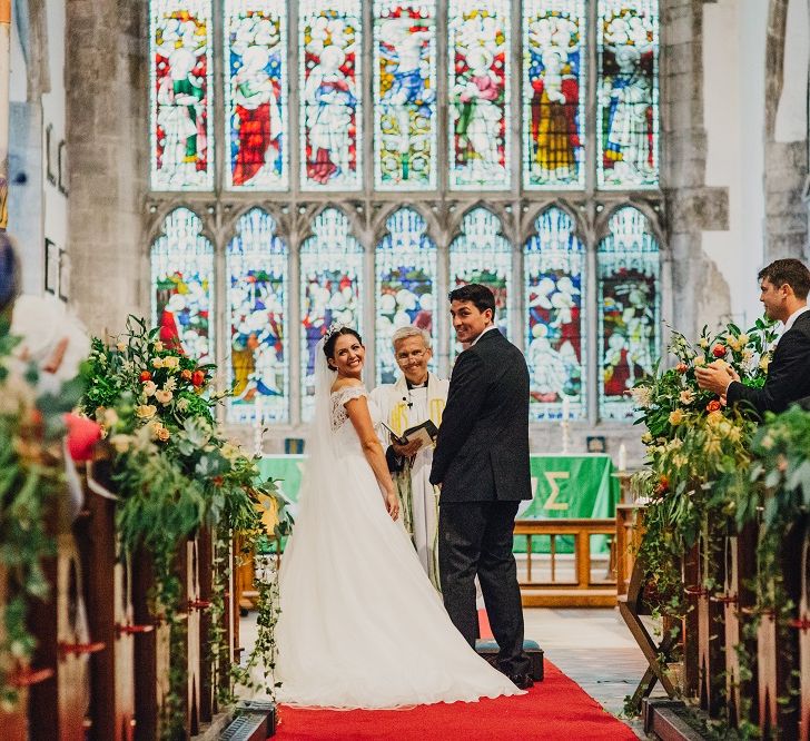 Church Wedding Ceremony | Bride in Suzanne Neville Heather Wedding Dress | Groom in Tuxedo | Coral & Green Wedding at The Italian Villa in Poole, Dorset with Japanese Gardens | Peppermint Love Photography | Wedding Memories Film