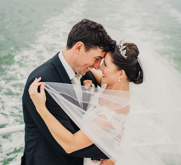 Bride in Suzanne Neville Heather Wedding Dress | Groom in Tuxedo | Coral & Green Wedding at The Italian Villa in Poole, Dorset with Japanese Gardens | Peppermint Love Photography | Wedding Memories Film