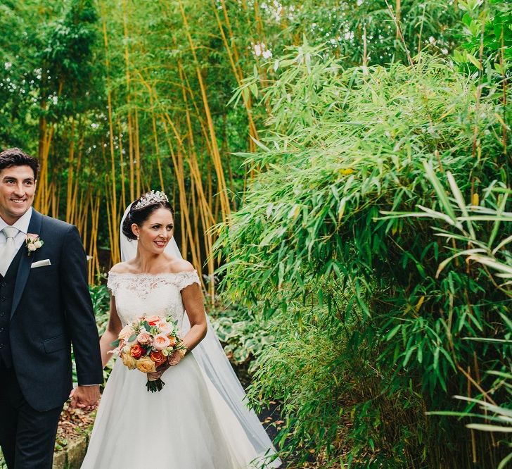 Bride in Suzanne Neville Heather Wedding Dress | Groom in Tuxedo | Coral & Green Wedding at The Italian Villa in Poole, Dorset with Japanese Gardens | Peppermint Love Photography | Wedding Memories Film