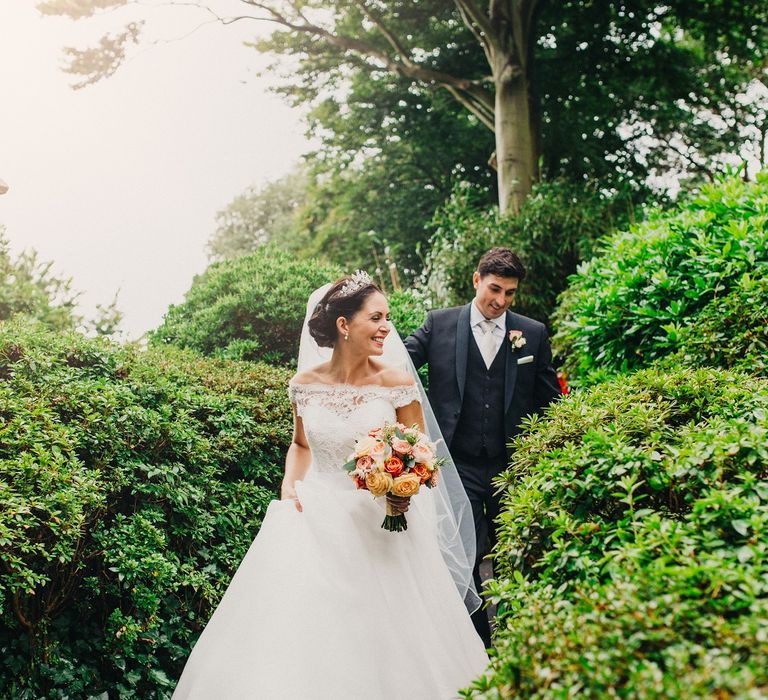 Bride in Suzanne Neville Heather Wedding Dress | Groom in Tuxedo | Coral & Green Wedding at The Italian Villa in Poole, Dorset with Japanese Gardens | Peppermint Love Photography | Wedding Memories Film