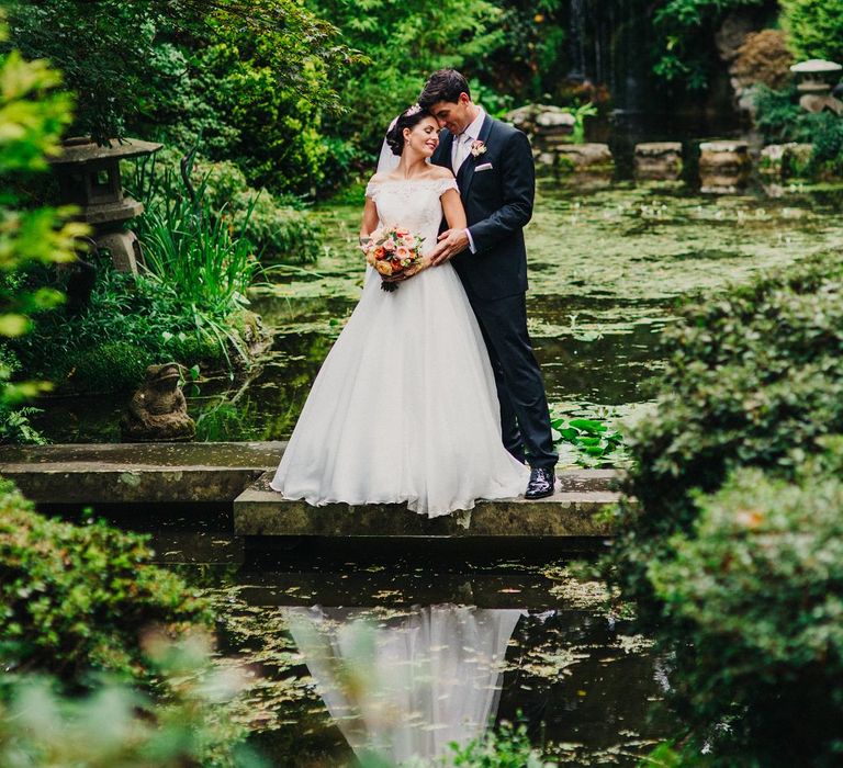 Bride in Justin Alexander 8800 Wedding Dress | Groom in Tuxedo | Coral & Green Wedding at The Italian Villa in Poole, Dorset with Japanese Gardens | Peppermint Love Photography | Wedding Memories Film