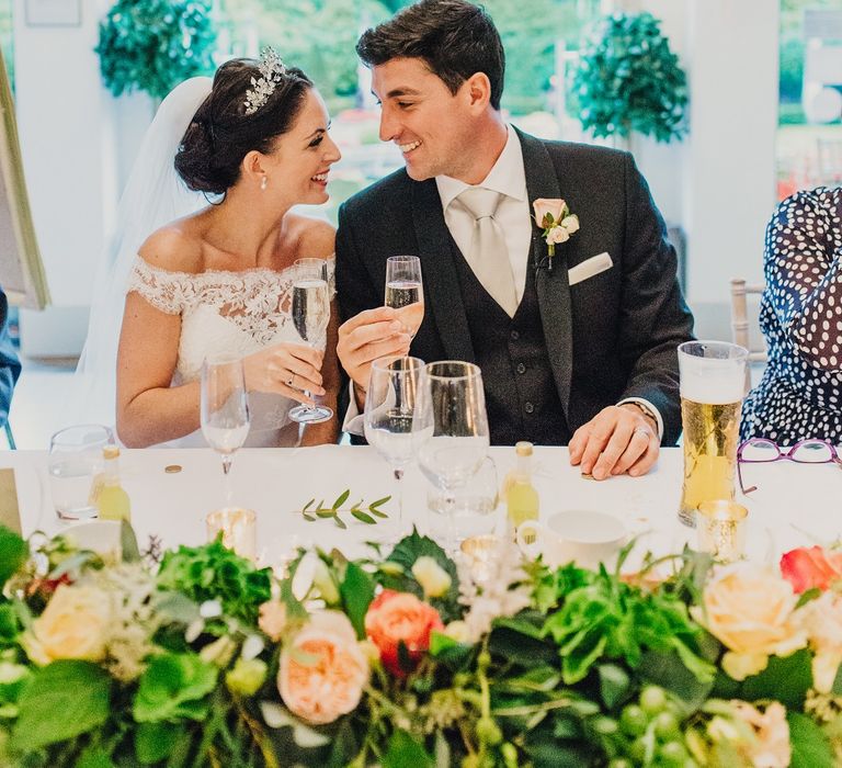 Bride in Suzanne Neville Heather Wedding Dress | Groom in Tuxedo | Coral & Green Wedding at The Italian Villa in Poole, Dorset with Japanese Gardens | Peppermint Love Photography | Wedding Memories Film