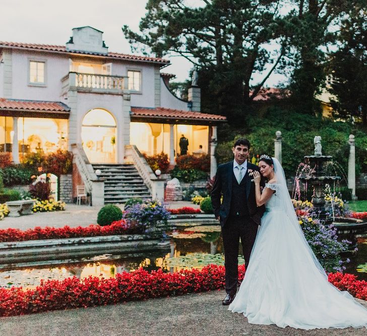 Bride in Suzanne Neville Heather Wedding Dress | Groom in Tuxedo | Coral & Green Wedding at The Italian Villa in Poole, Dorset with Japanese Gardens | Peppermint Love Photography | Wedding Memories Film