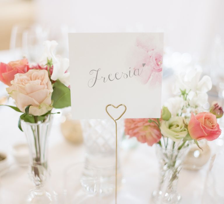 Flower Table Names & Pink Flower Stems in Bud Vases as Centrepieces