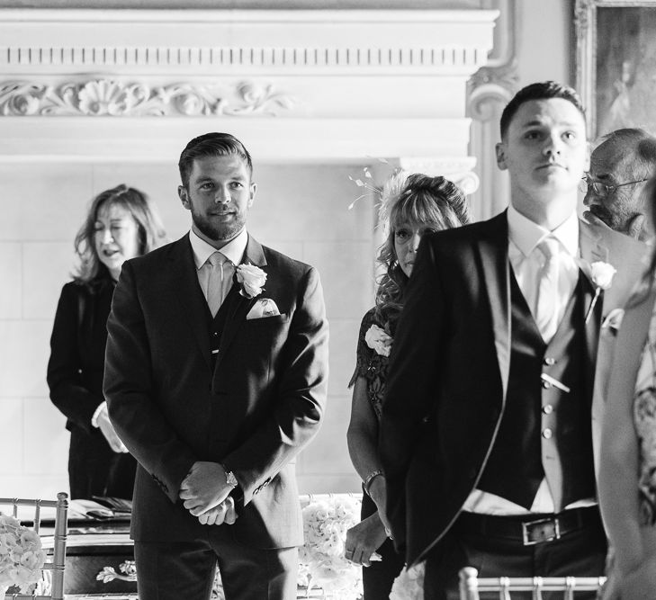 Groom at the Altar in Reiss Navy Three Piece Suit