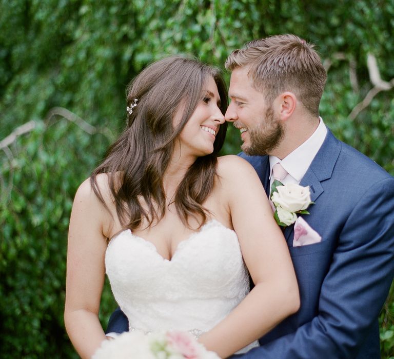 Bride & Groom Embrace