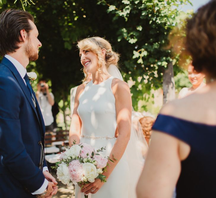 Outdoor Italian Wedding Ceremony at Borgo Petrognano Planned by Tuscan Wedding Planners| Frances Sales Photography