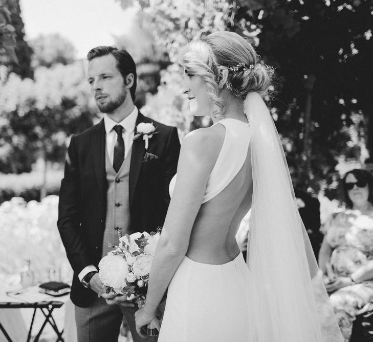 Bride in Backless Sarah Seven Gown | Outdoor Italian Wedding Ceremony at Borgo Petrognano Planned by Tuscan Wedding Planners| Frances Sales Photography