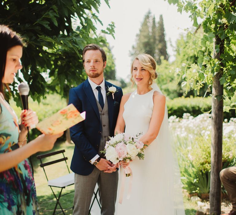 Bride in Sarah Seven Orleans Gown | Outdoor Italian Wedding Ceremony at Borgo Petrognano Planned by Tuscan Wedding Planners | Frances Sales Photography