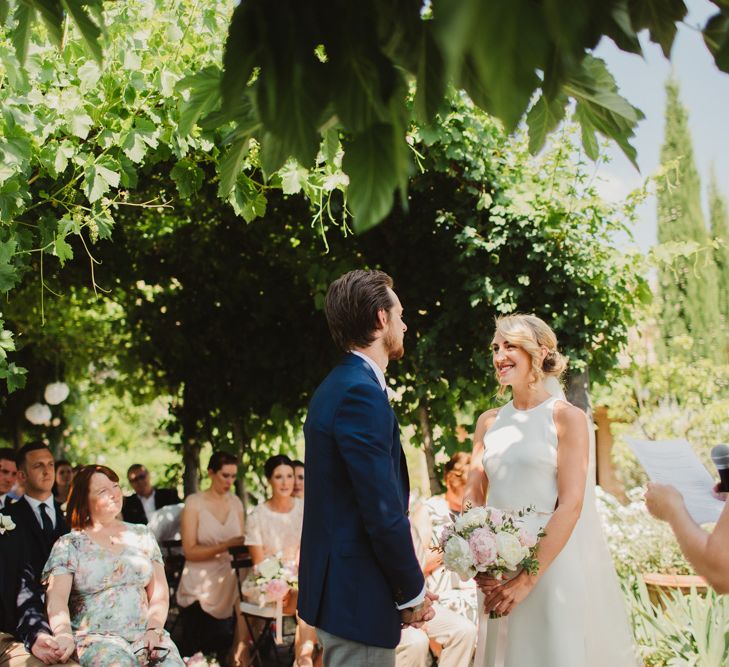 Bride in Sarah Seven Orleans Gown | Outdoor Italian Wedding Ceremony at Borgo Petrognano Planned by Tuscan Wedding Planners | Frances Sales Photography