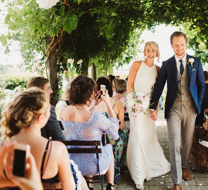 Bride in Sarah Seven Orleans Gown | Outdoor Italian Wedding Ceremony at Borgo Petrognano Planned by Tuscan Wedding Planners | Frances Sales Photography