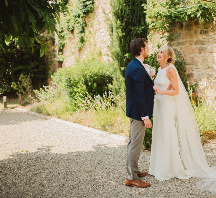 Bride in Sarah Seven Orleans Gown | Groom in Grey & Navy Suit | Frances Sales Photography