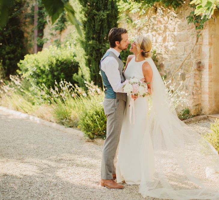 Bride in Sarah Seven Orleans Gown | Groom in Grey & Navy Suit | Frances Sales Photography