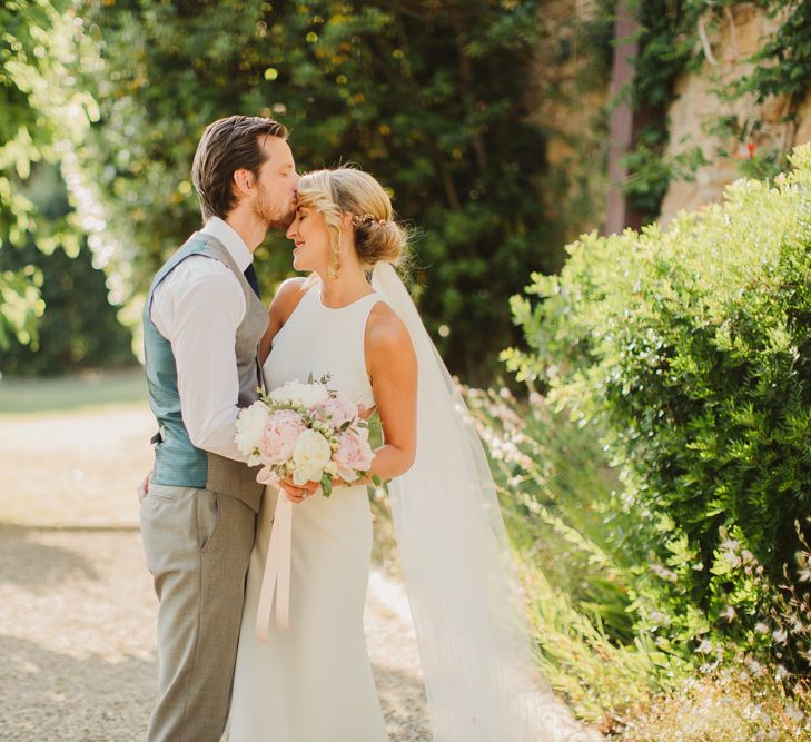 Bride in Sarah Seven Orleans Gown | Groom in Grey & Navy Suit | Frances Sales Photography