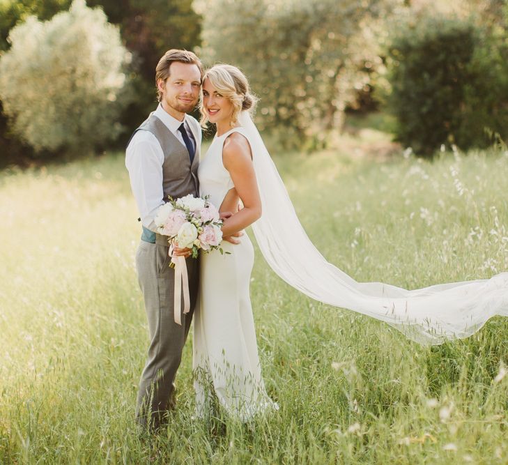 Bride in Sarah Seven Orleans Gown | Groom in Grey & Navy Suit | Frances Sales Photography