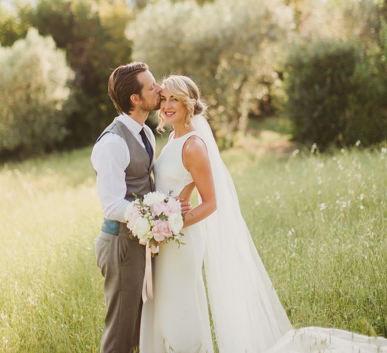 Bride in Sarah Seven Orleans Gown | Groom in Grey & Navy Suit | Frances Sales Photography