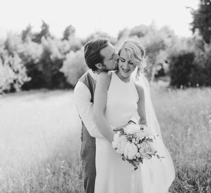 Bride in Sarah Seven Orleans Gown | Groom in Grey & Navy Suit | Frances Sales Photography