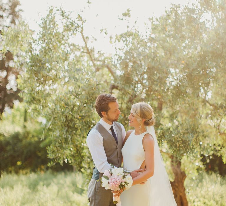 Bride in Sarah Seven Orleans Gown | Groom in Grey & Navy Suit | Frances Sales Photography