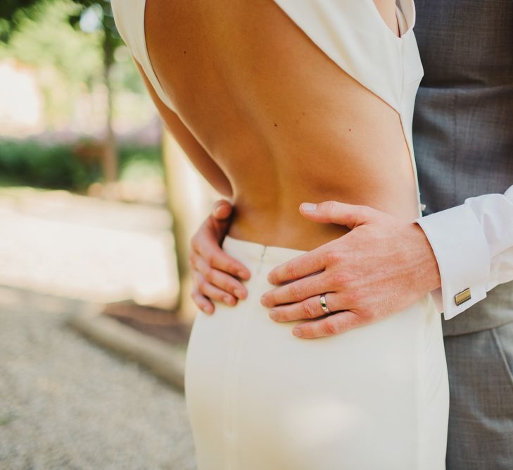 Bride in Backless Sarah Seven Orleans Gown | Groom in Grey & Navy Suit | Frances Sales Photography