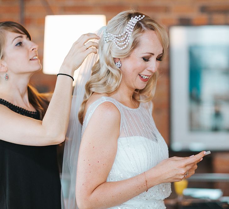 Bride in Rosa Clara Veleta Wedding Dress & Danani Headpiece