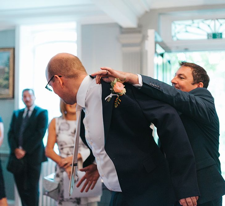 Groom in Chester Barrie Suit