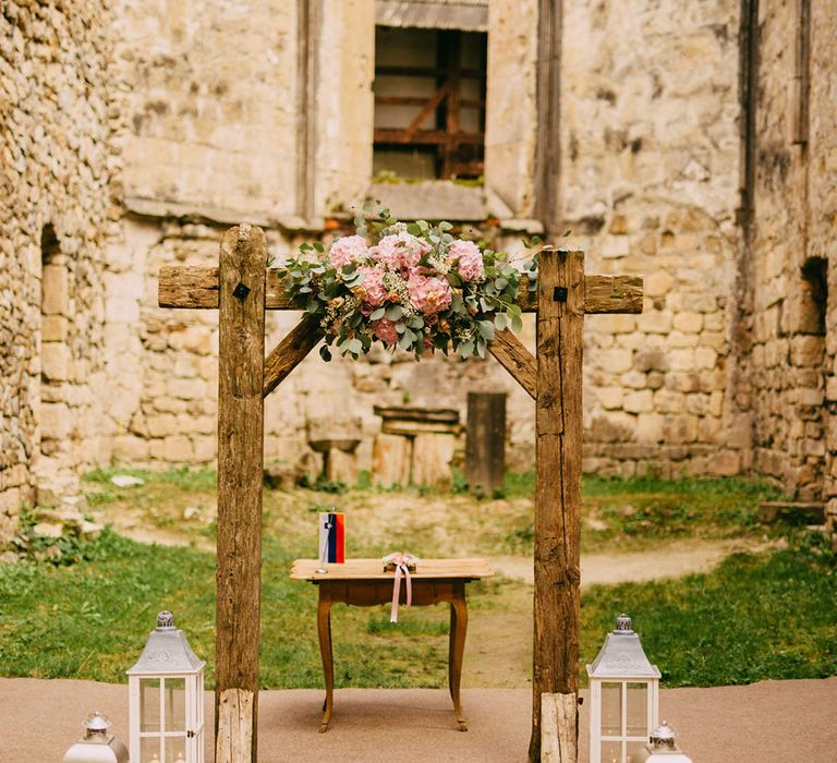 Wooden Altar with Floral Decor & Lanterns