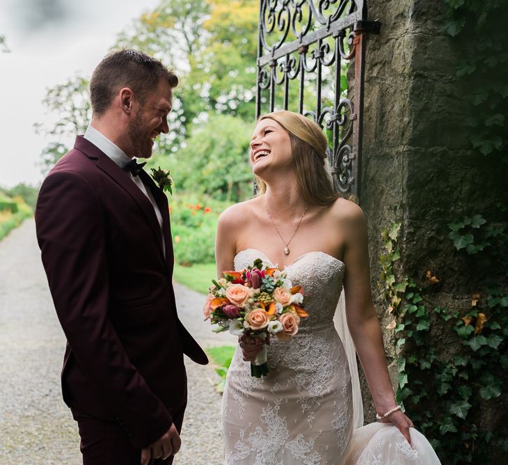 Bride in Lace Sweetheart Neckline Dress | Groom in Burgundy Suit | Kathy Silke Photography