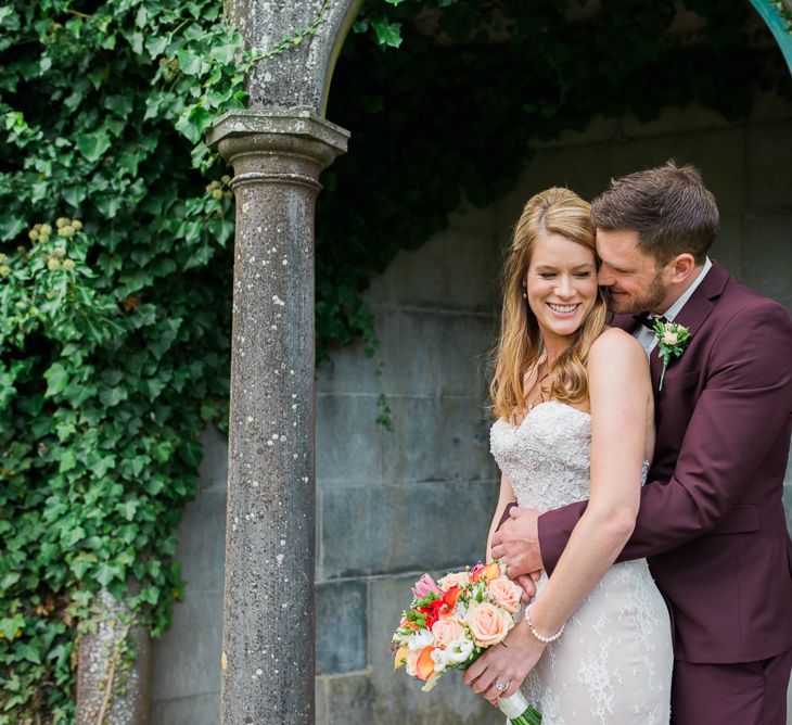 Bride in Lace Sweetheart Neckline Dress | Groom in Burgundy Suit | Kathy Silke Photography