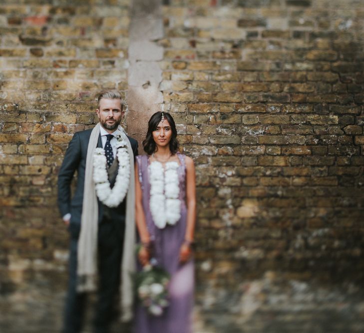 Bride In Lavender Sari & Groom In Reiss Suit