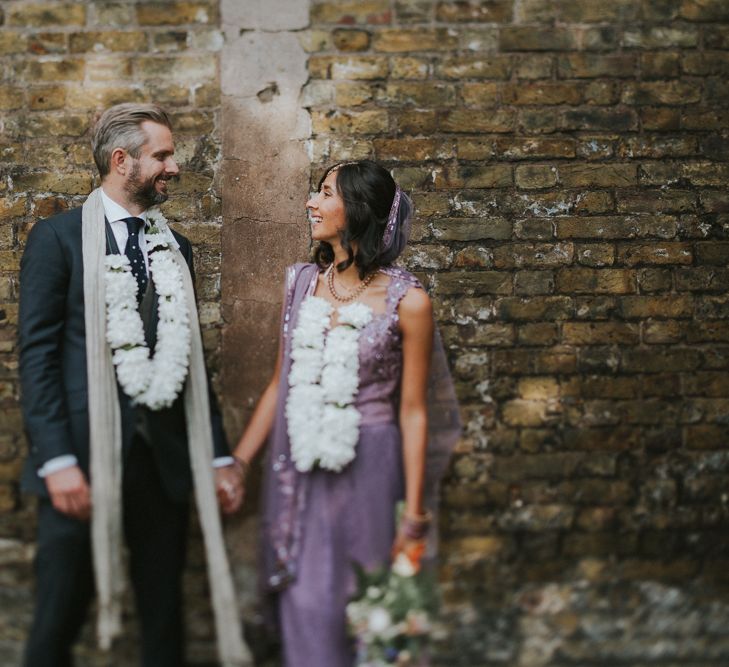 Bride In Lavender Sari & Groom In Reiss Suit