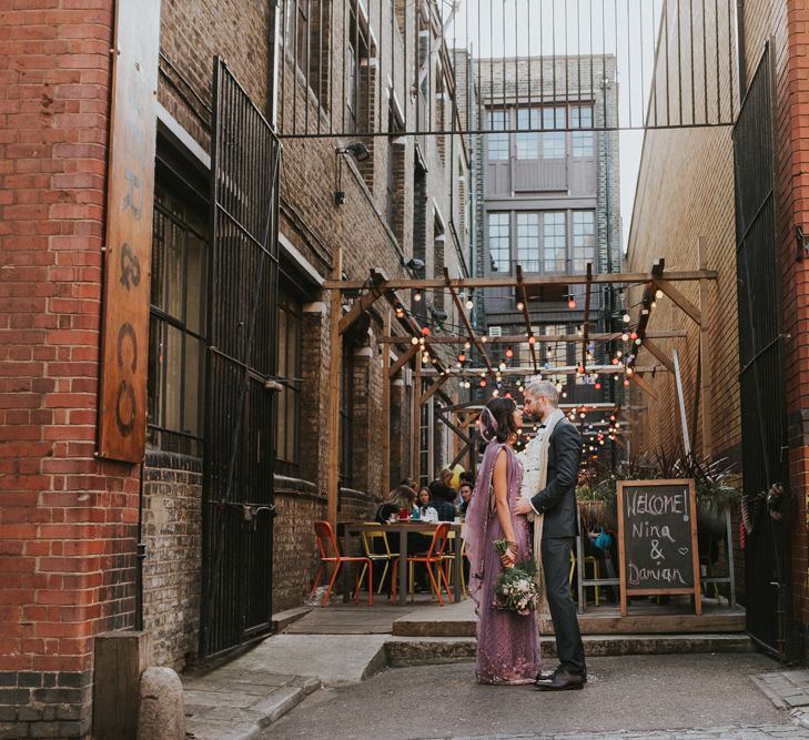 Bride In Lavender Sari & Groom In Reiss Suit