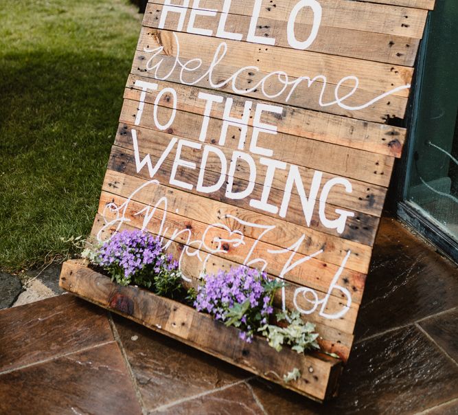 Wooden Palette Welcome Sign | Lilac & Navy Rustic Wedding at Stone Barn, Cotswolds | Frankee Victoria Photography