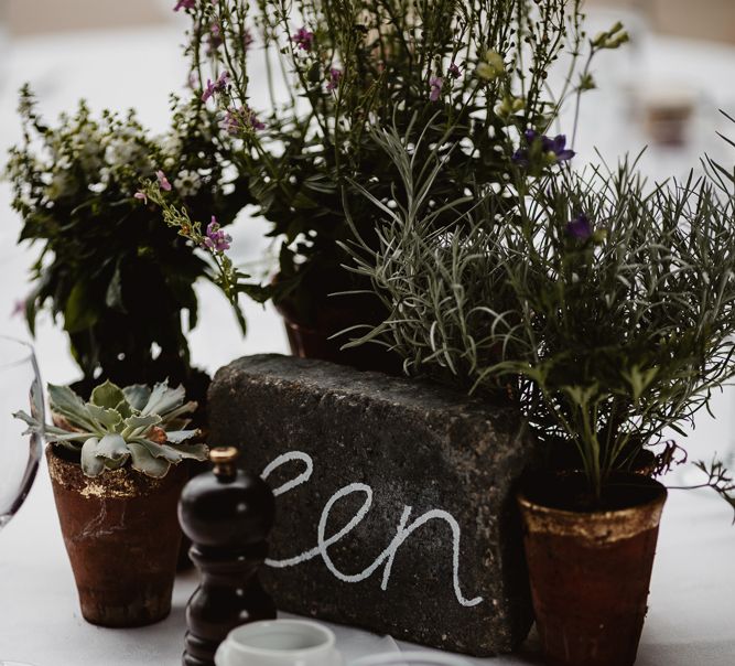 Wild Flower Plant Pot Centrepieces | Lilac & Navy Rustic Wedding at Stone Barn, Cotswolds | Frankee Victoria Photography